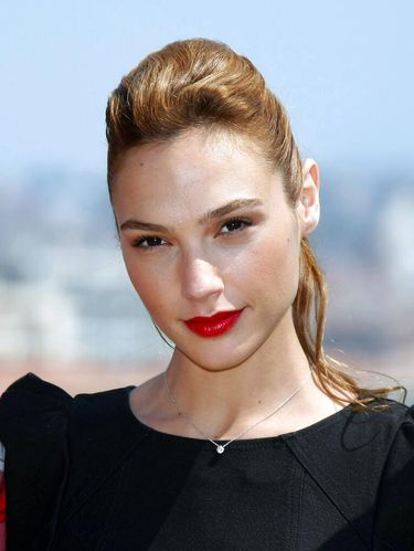 Actress Gal Gadot poses during a photocall to promote the film 
