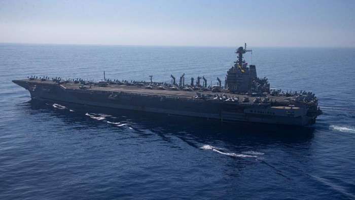 The world?s largest aircraft carrier USS Gerald R. Ford steams alongside USNS Laramie (T-AO-203) during a fueling-at-sea in the eastern Mediterranean Sea, as a scheduled deployment in the U.S Naval Forces Europe area of operations, deployed by U.S. Sixth Fleet to defend U.S, allied, and partners interests, in this photo taken on October, 11, 2023 and released by U.S. Navy on October 14, 2023. U.S Naval Forces Central Command / U.S. 6th Fleet / Handout via REUTERS ATTENTION EDITORS - THIS PICTURE WAS PROVIDED BY A THIRD PARTY
