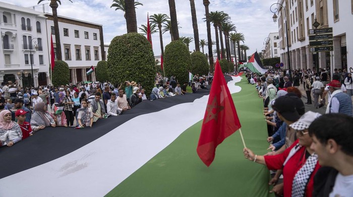 Thousands of Moroccans take part in a protest in solidarity with Palestinians in Gaza, in Rabat, Morocco, Sunday, Oct. 15, 2023. (AP Photo/Mosa'ab Elshamy)