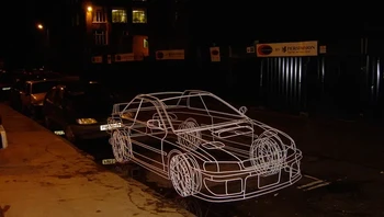 Keren! Ini adalah seni kawat berwujud mobil karya dari Benedict Radcliffe. Foto: Brightside
