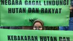 Aksi Teatrikal Desak Pemerintah Tindak Perusahaan yang Terlibat Karhutla