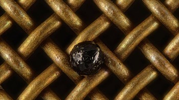 Juara kedelapan belas diraih  Scott Peterson . Menampilkan gambar Mikrometeorit kriptokristalin bertumpu pada saringan pengujian #80 Foto: Nikon Small World Photomicrography