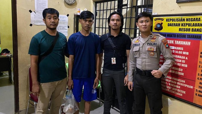 Tampang Ajat saat diamankan usai membacok brutal istrinya