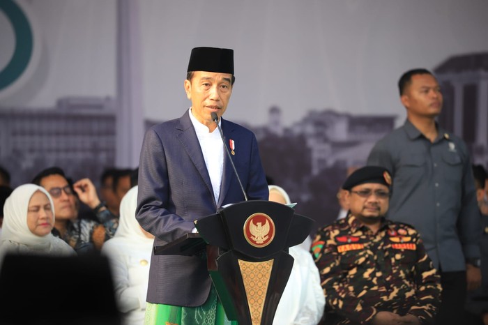 Presiden Joko Widodo saat menjadi pembina apel Hari Santri 2023, Minggu (22/10/2023).