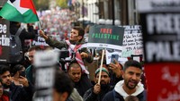 Aksi solidarita untuk Pelastina dilakukan di London, Sabtu (21/10) waktu setempat. 