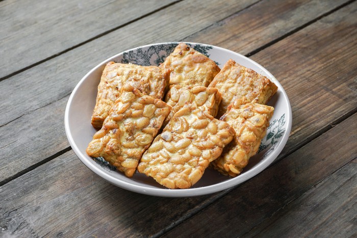 Fried Tempeh or Tempe is a traditional Malay dish snack popular in Malaysian, Indonesian, and Singapore