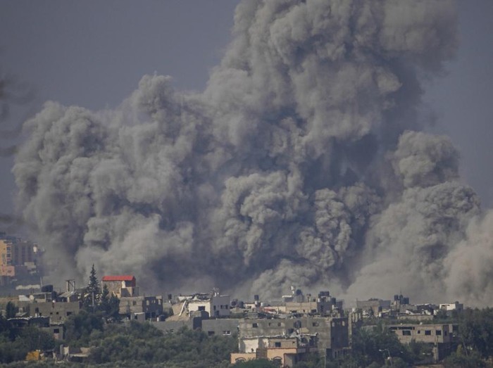 Smoke rises following an Israeli airstrike in the Gaza Strip, as seen from southern Israel, Monday, Oct. 23, 2023. (AP Photo/Ariel Schalit)