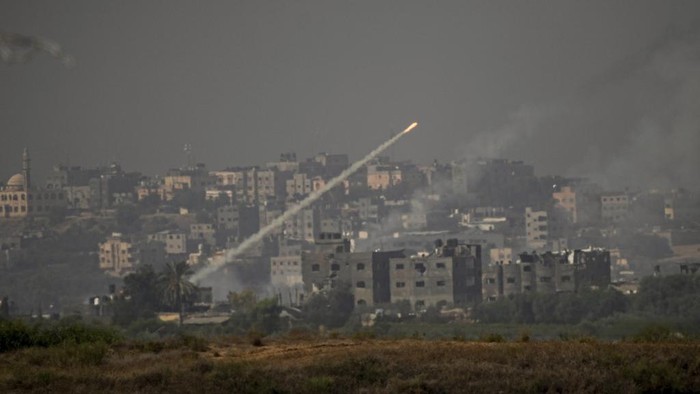 Smoke rises following an Israeli airstrike in the Gaza Strip, as seen from southern Israel, Monday, Oct. 23, 2023. (AP Photo/Ariel Schalit)