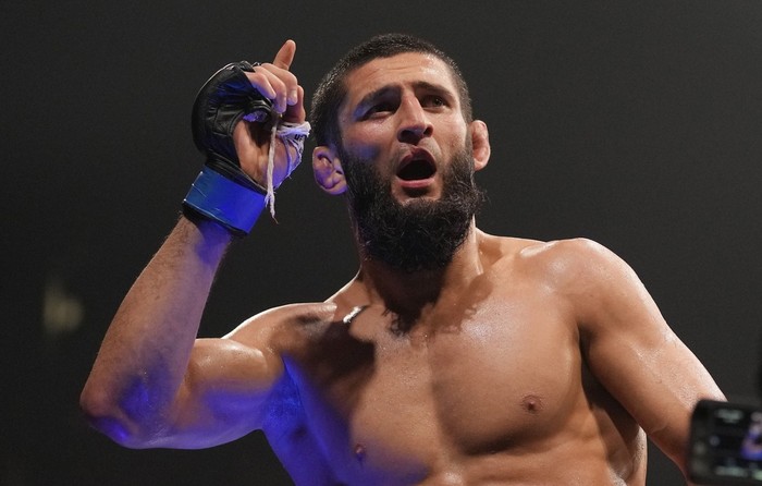Khamzat Chimaev of the United Arab Emirates, celebrates after he beats Kamaru Usman of Nigeria, in the UFC middleweight championship fight at the Ethihad Arena in Abu Dhabi, United Arab Emirates, Saturday, Oct. 21, 2023. (AP Photo/Kamran Jebreili)