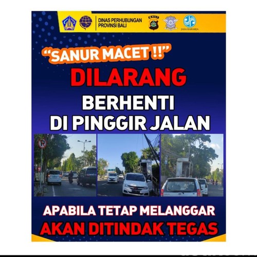 Pengumuman larangan parkir di Jalan Bypass Ngurah Rai.