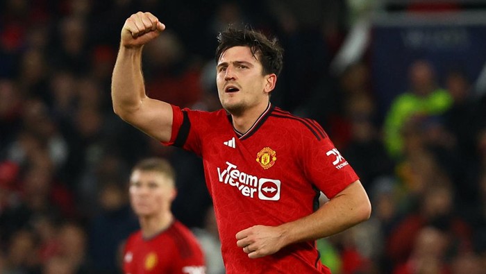 Soccer Football - Champions League - Group A - Manchester United v FC Copenhagen - Old Trafford, Manchester, Britain - October 24, 2023 Manchester Uniteds Harry Maguire celebrates scoring their first goal REUTERS/Molly Darlington