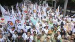 Pendukung Prabowo-Gibran Ramaikan Taman Suropati