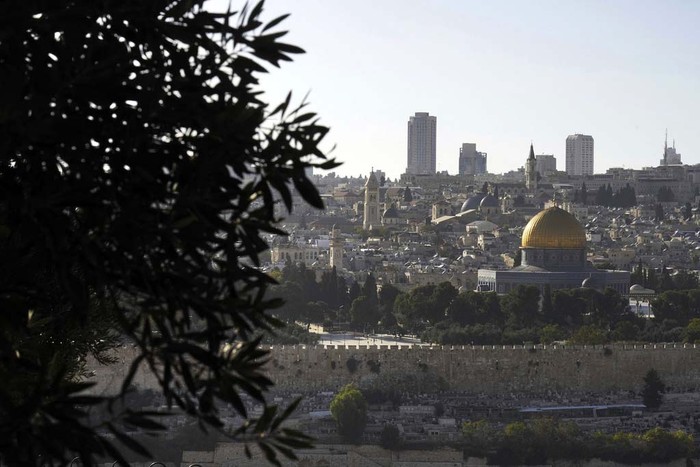Jews pray at the Western Wall, beside the Temple Mount, known to Muslims as the Noble Sanctuary, or the Al-Aqsa Mosque compound, in the Old City of Jerusalem, Monday, Oct. 16, 2023. (AP Photo/Jon Gambrell)