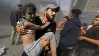 Jumlah total korban tewas anak-anak dalam perang di Jalur Gaza itu diperkirakan bisa lebih tinggi, dengan sedikitnya 1.000 anak-anak dilaporkan hilang dan diduga tertimbun reruntuhan bangunan yang hancur akibat pengeboman Israel. REUTERS/MOHAMMED SALEM