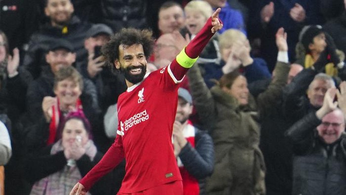 Liverpools Mohamed Salah celebrates after scoring his sides fifth goal during the Europa League Group E soccer match between Liverpool and Toulouse, at Anfield in Liverpool, England, Thursday, Oct. 26, 2023. (AP Photo/Jon Super)