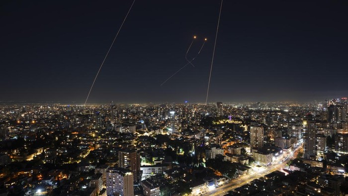 Israeli Iron Dome air defense system fires to intercept a rocket fired from the Gaza Strip, in central Israel, Thursday, Oct. 26, 2023. (AP Photo/Oded Balilty)