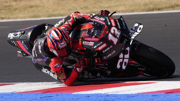 Spains Maverick Vinales rides his Aprilia during the MotoGP sprint race for Sundays San Marino and Riviera di Rimini Motorcycle Grand Prix at the Misano circuit in Misano Adriatico, Italy, Saturday, Sept. 9, 2023. (AP Photo/Antonio Calanni)