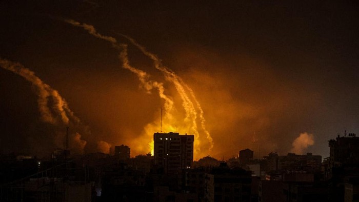 GAZA STRIP, GAZA - OCTOBER 28: Smoke rises and billows in different regions of Gaza as the Israeli army conducts the most intense air attacks on the 21st day in Gaza Strip, Gaza on October 28, 2023. Due to Israel cutting off electricity and not allowing fuel supplies, Gaza was plunged into darkness, and the sky was frequently illuminated by the bombs being dropped by Israeli aircraft. (Photo by Ali Jadallah/Anadolu via Getty Images)