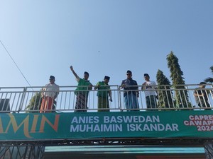 Anies-Cak Imin Sarungan Jalan Sehat Bareng Santri di Jember, Ini Janjinya
