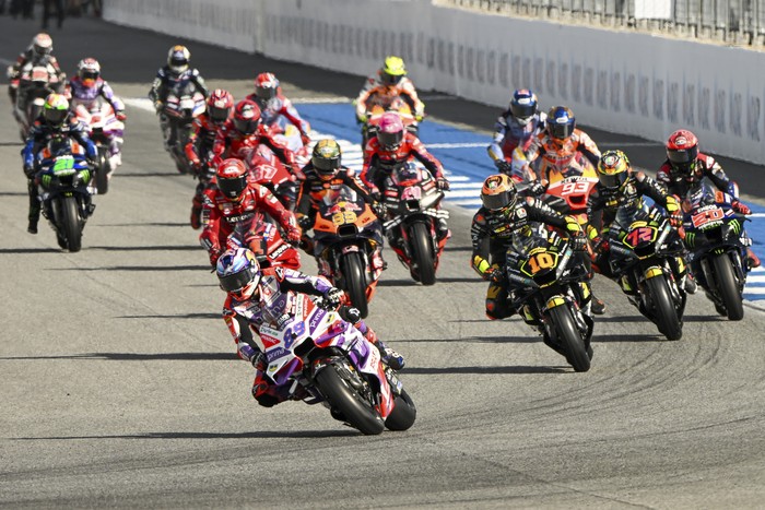 Spains Jorge Martin leads the pack of riders during the MotoGP sprint race at the Chang International Circuit in Buriram, Thailand, Saturday, Oct. 28, 2023. (AP Photo/ Kittinun Rodsupan)