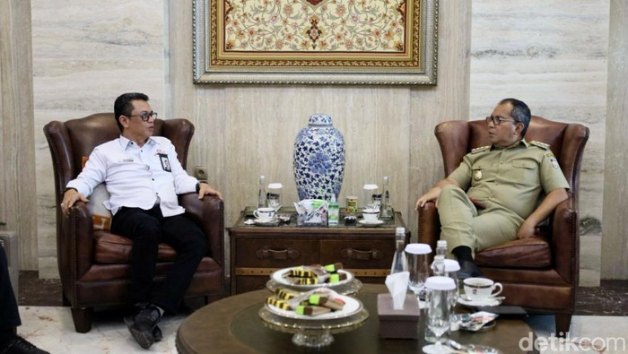 Kepala Ombudsman Sulsel Ismu Iskandar dan Wali Kota Makassar Danny Pomanto.