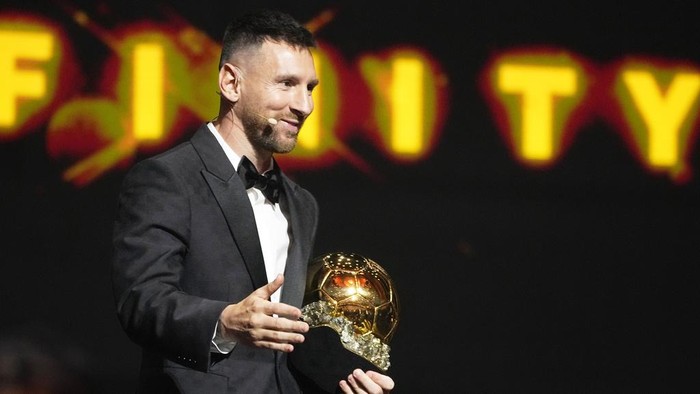 Inter Miamis and Argentinas national team player Lionel Messi receives the 2023 Ballon dOr trophy during the 67th Ballon dOr (Golden Ball) award ceremony at Theatre du Chatelet in Paris, France, Monday, Oct. 30, 2023. (AP Photo/Michel Euler)