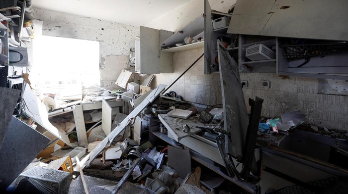 A view inside a building damaged by a rocket that was launched from the Gaza Strip and landed in Netivot, in southern Israel, October 30, 2023. REUTERS/Amir Cohen