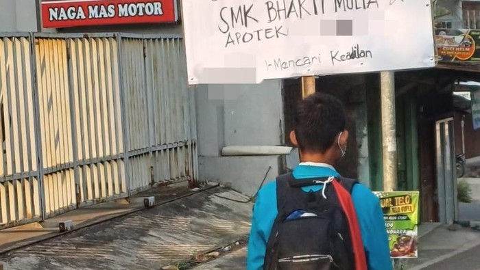 Foto viral di media sosial Whatsapp seorang siswa SMK Bhakti Mulia menuntut keadilan.