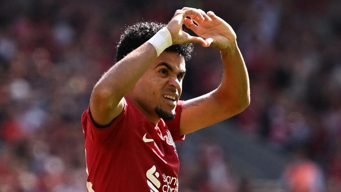 (FILES) Liverpools Colombian midfielder Luis Diaz celebrates after scoring their first goal during the English Premier League football match between Liverpool and Bournemouth at Anfield in Liverpool, north west England on August 27, 2022. The mother of Colombian footballer Luis Diaz, who plays for Liverpool of England, was rescued on October 28, 2023, after the authorities reported the kidnapping of his parents in the department of Guajira (north), said President Gustavo Petro. (Photo by Oli SCARFF / AFP) / RESTRICTED TO EDITORIAL USE. No use with unauthorized audio, video, data, fixture lists, club/league logos or live services. Online in-match use limited to 120 images. An additional 40 images may be used in extra time. No video emulation. Social media in-match use limited to 120 images. An additional 40 images may be used in extra time. No use in betting publications, games or single club/league/player publications. /