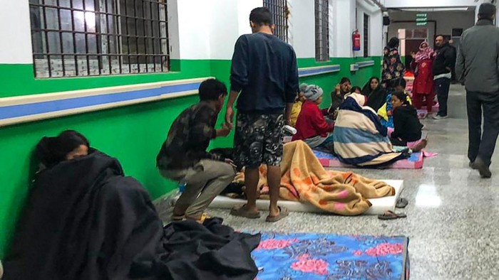 NEPAL-EARTHQUAKE Survivors are seen at the Jajarkot district hospital in the aftermath of an earthquake in Jajarkot on November 4, 2023. More than 60 people were killed when a shallow 5.6-magnitude earthquake hit a remote pocket of Nepal, officials said early on November 4. The tremor hit the far west of the Himalayan country late Friday and was measured by the US Geological Survey at just 18 kilometres (11 miles) deep. (Photo by Balkumar Sharma / AFP)