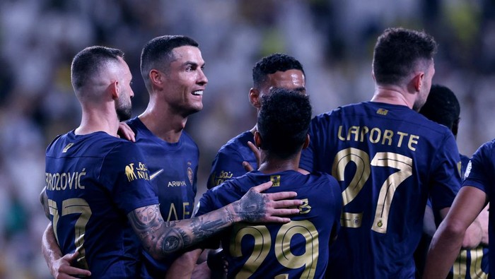Soccer Football - Saudi Pro League - Al Nassr v Al Khaleej - Al-Awwal Park, Riyadh, Saudi Arabia - November 4, 2023 Al Nassrs Aymeric Laporte celebrates scoring their second goal with teammates REUTERS/Ahmed Yosri