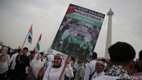 Aksi solidaritas terhadap Palestina juga berlangsung di Indonesia. Massa menggelar aksi itu di kawasan Monas, Jakarta Pusat. Agung Pambudhy/detikcom
