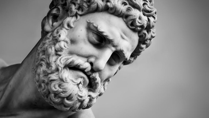 Ancient head close-up sculpture of Hercules and Nessus in Loggia dei Lanzi in Florence, Italy. Black and white