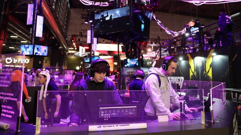 Cosplayers pose for a photo at the Paris Games Week (PGW), a trade fair for video games in Paris, France, November 5, 2023. REUTERS/Claudia Greco