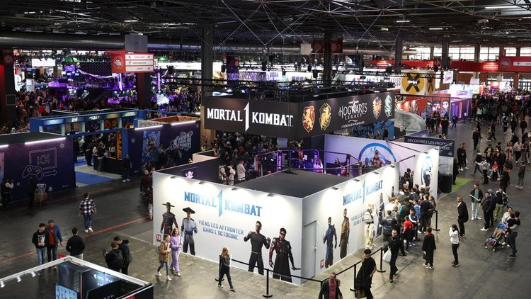 Cosplayers pose for a photo at the Paris Games Week (PGW), a trade fair for video games in Paris, France, November 5, 2023. REUTERS/Claudia Greco