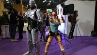 Cosplayers pose for a photo at the Paris Games Week (PGW), a trade fair for video games in Paris, France, November 5, 2023. REUTERS/Claudia Greco