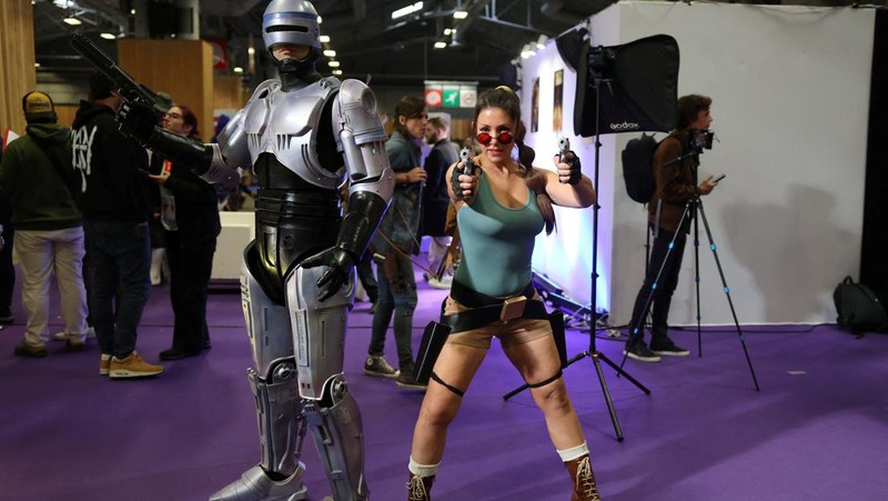 Cosplayers pose for a photo at the Paris Games Week (PGW), a trade fair for video games in Paris, France, November 5, 2023. REUTERS/Claudia Greco