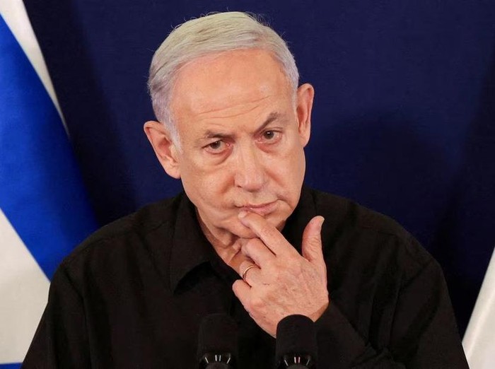 Israeli Prime Minister Benjamin Netanyahu speaks during a press conference with Defense Minister Yoav Gallant and Cabinet Minister Benny Gantz in the Kirya military base in Tel Aviv , Israel , 28 October 2023. ABIR SULTAN POOL/Pool via REUTERS/File Photo Acquire Licensing Rights