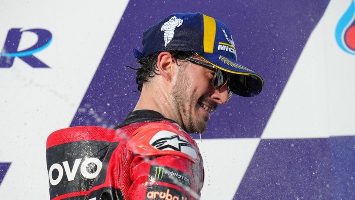 MotoGP - Thailand Grand Prix - Chang International Circuit, Buriram, Thailand - October 29, 2023 Ducati Lenovo Teams Francesco Bagnaia celebrates on the podium after finishing second in the MotoGP REUTERS/Athit Perawonmetha