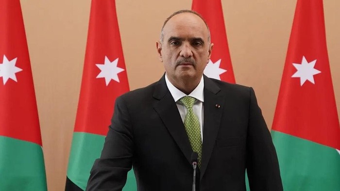 A handout picture released by the Jordanian Royal Palace on October 12, 2020, shows Bisher al-Khasawneh being sworn in as the new PM of Jordan, in the capital Amman. (File photo: AFP)