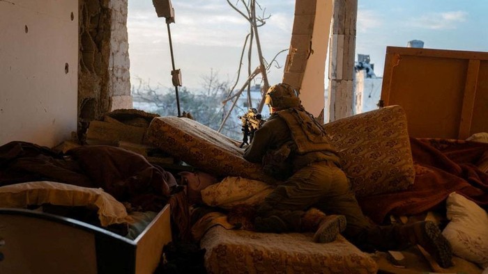 Israeli soldiers take part in ground operations, amid the ongoing conflict between Israel and the Palestinian Islamist group Hamas, at a location given as Gaza in this handout photo released November 7, 2023. Israeli Defence Forces/Handout via REUTERS THIS IMAGE HAS BEEN SUPPLIED BY A THIRD PARTY