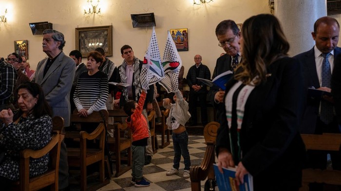 Vera Baboun, Palestinian ambassador to Chile, addresses the congregation during mass at the San Jorge Cathedral in the Patronato neighbourhood, in Santiago, Chile October 22, 2023. REUTERS/Alexander Villegas