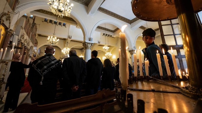 Vera Baboun, Palestinian ambassador to Chile, addresses the congregation during mass at the San Jorge Cathedral in the Patronato neighbourhood, in Santiago, Chile October 22, 2023. REUTERS/Alexander Villegas