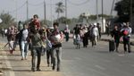 Kibarkan Bendera Putih, Ribuan Warga Gaza Mencari Tempat Berlindung