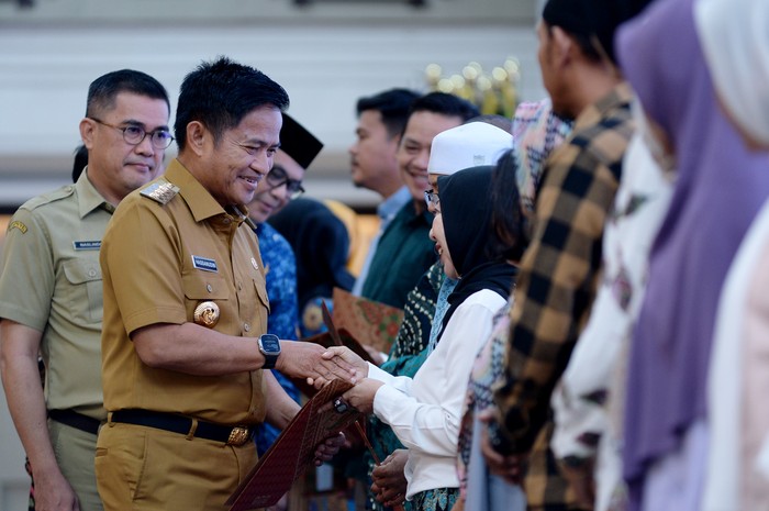 PJ Gubernur Sumut Bagikan NIB