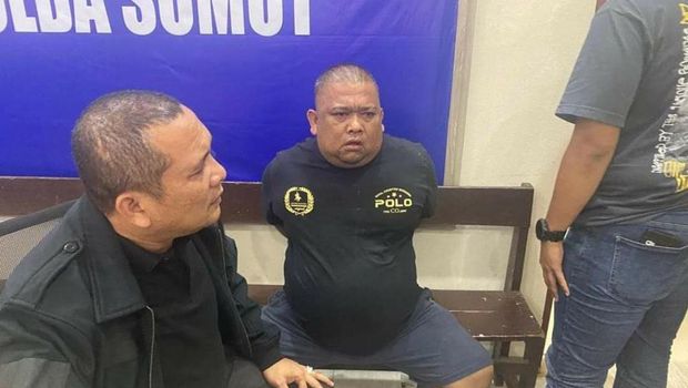 Samsul Tarigan (tengah), DPO kasus penyerangan polisi usai ditangkap. (Istimewa)