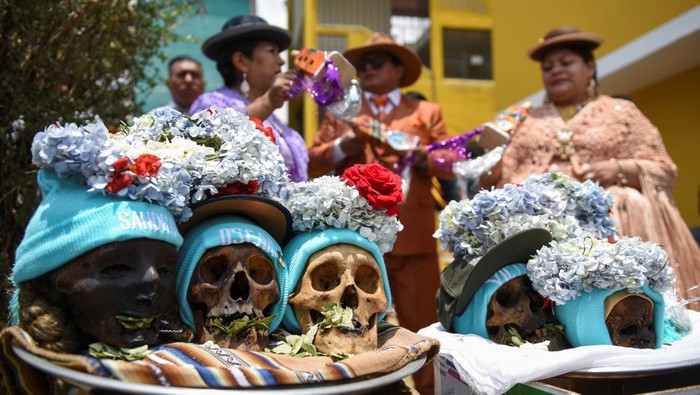 Believers gather at La Paz's main cemetery to celebrate the Day of Skulls or 