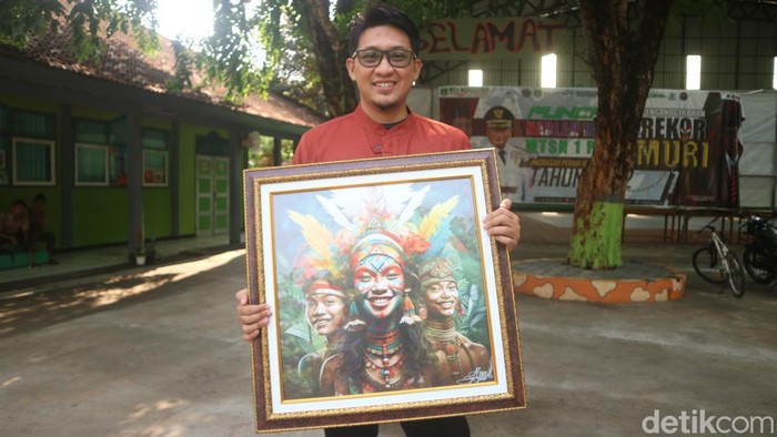 Guru MTs Negeri 1 Pati Faiz Affan (32) memperoleh penghargaan seni digital tingkat Internasional berkat karyanya berjudul Diversity, Sabtu (11/11/2023).
