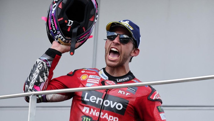 MotoGP - Malaysian Grand Prix - Sepang International Circuit, Sepang, Malaysia - November 12, 2023 Ducati Lenovo Teams Enea Bastianini celebrates on the podium after winning the race REUTERS/Hasnoor Hussain