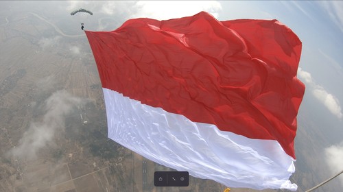 Pengibaran Bendera Raksasa di udara oleh Pasukan Marinir dalam rangka menyambut HUT Marinir.